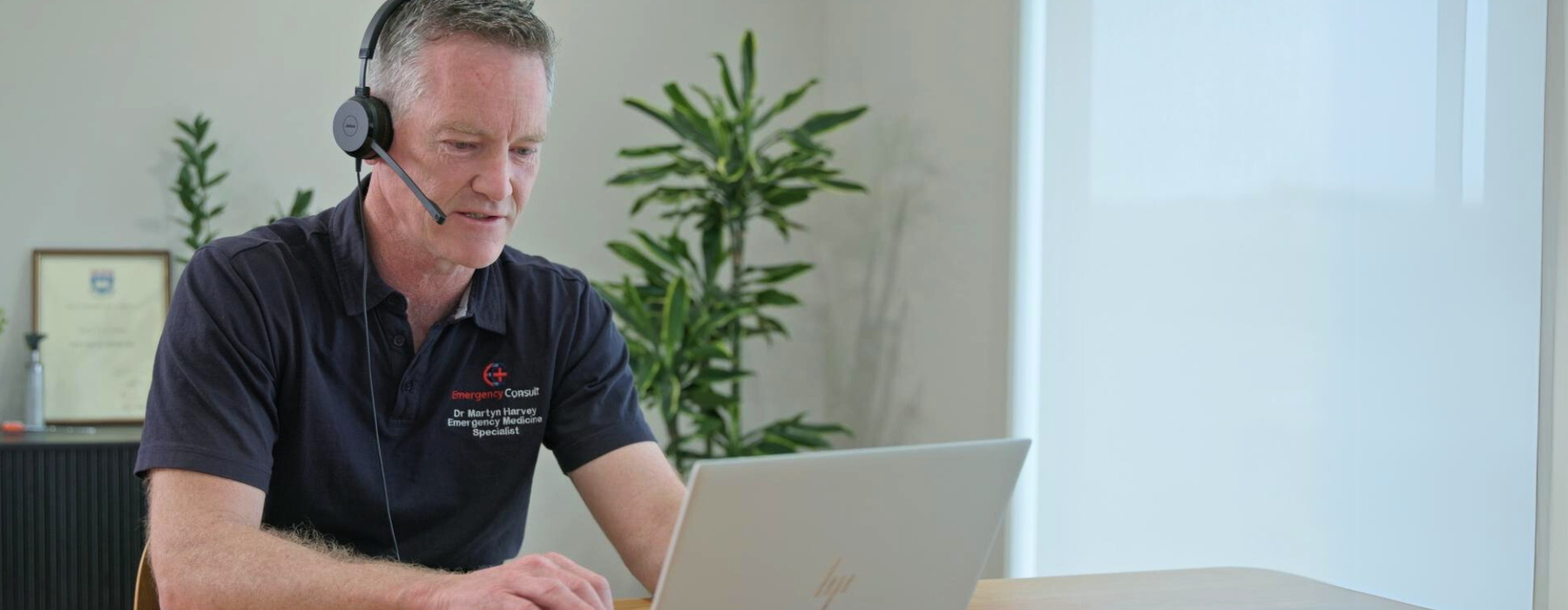Emergency medicine doctor on a video consult from remote home office location.